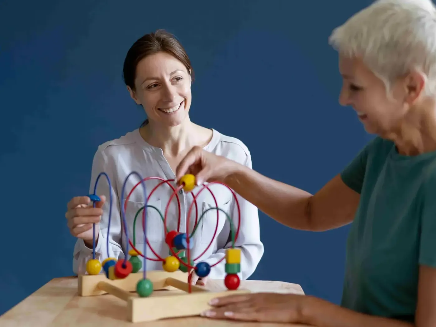 Clinician guiding a patient through a balance and coordination exercise